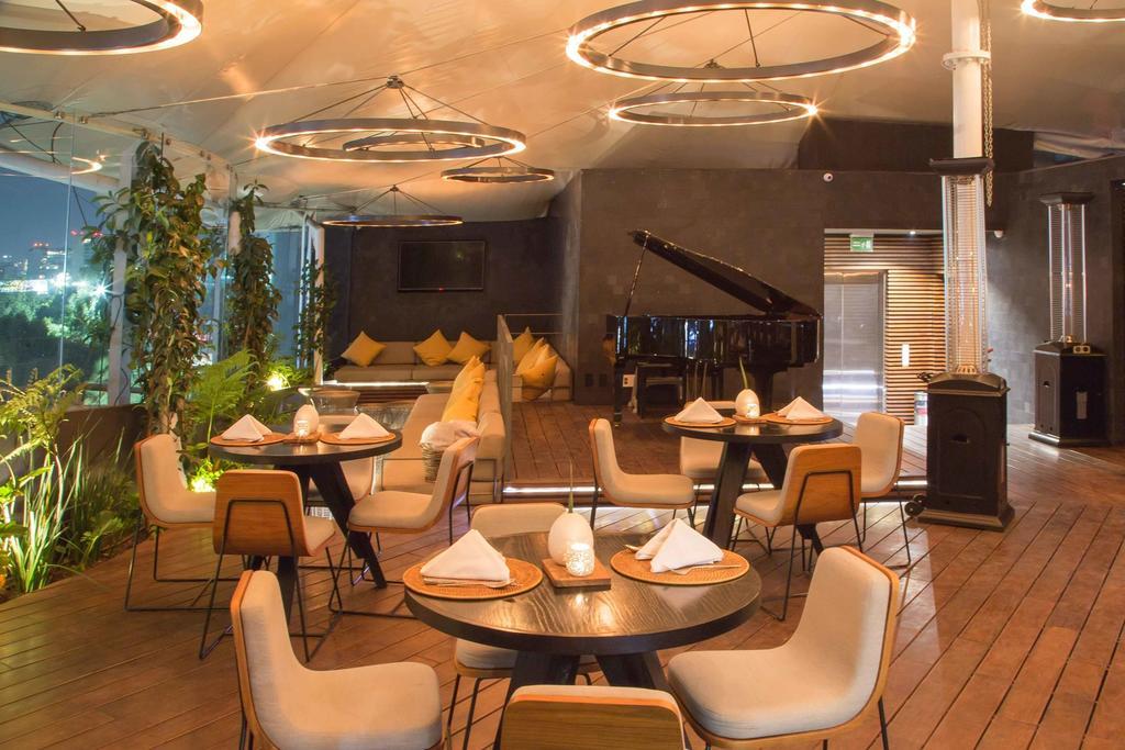 Suites Contempo Мехико Экстерьер фото The interior of the restaurant